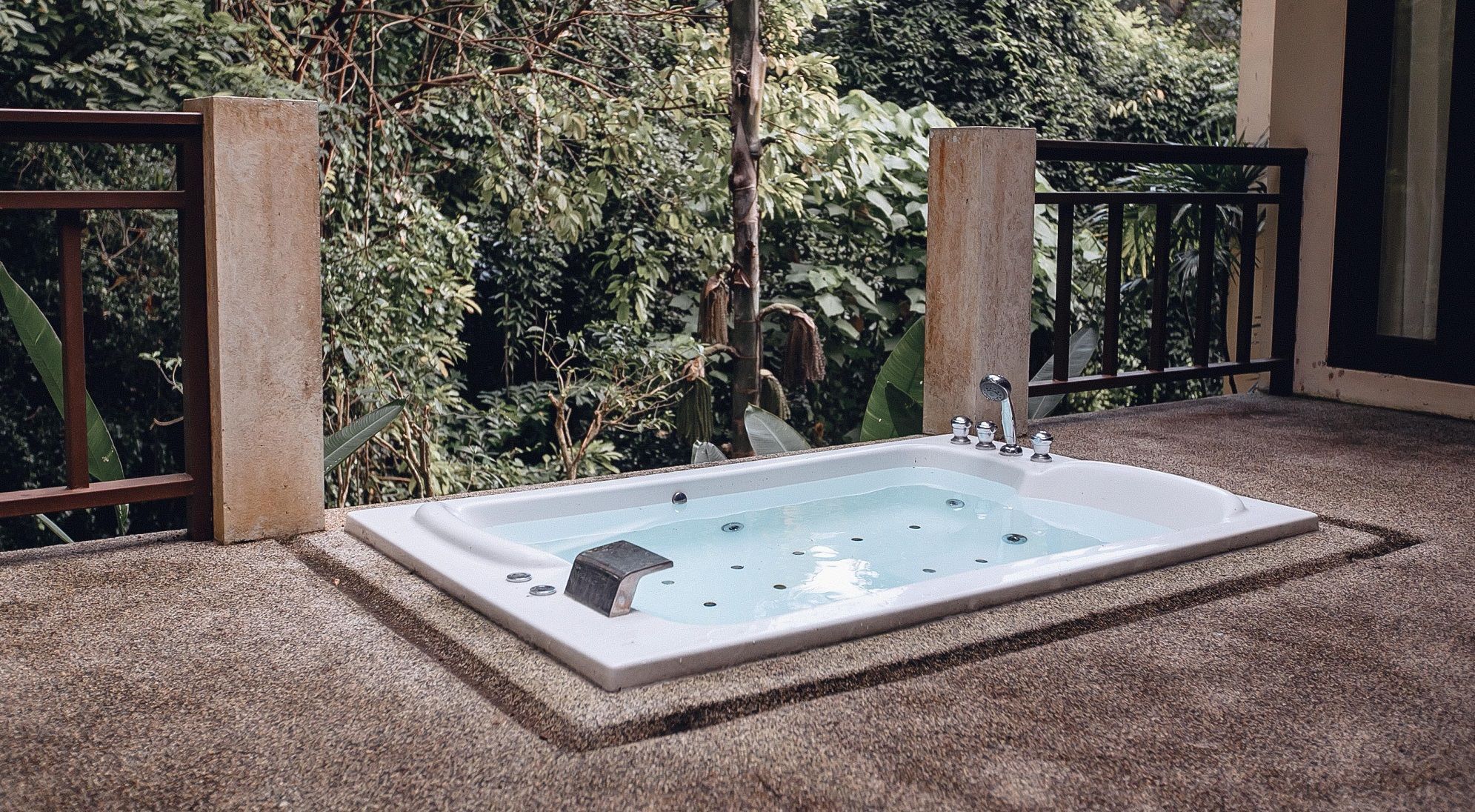 picture stylish luxury white empty outdoor jacuzzi with water relax nature against background plants expensive vacation abroad villa tropics