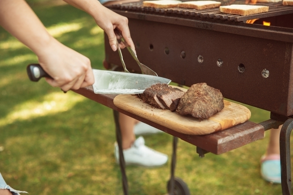 Close up of meat grilling barbecue summer lifestyle