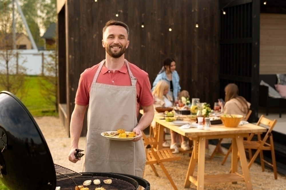 Medium shot man holding food plate