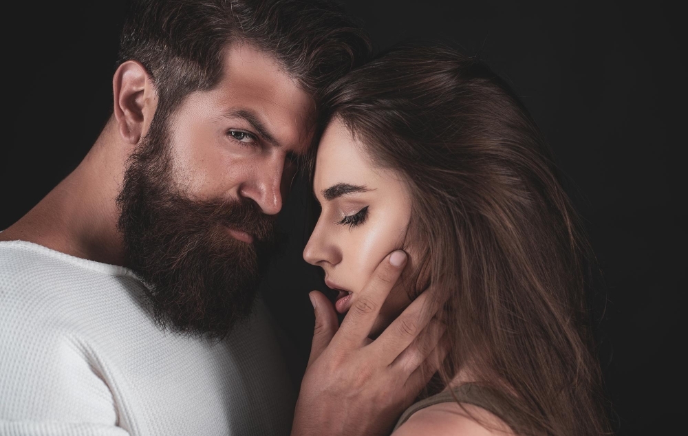 People in love retro couple handsome young man seducing his lovely girlfriend beautiful young couple