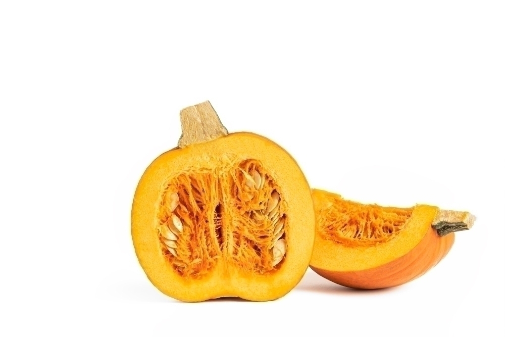 citrulline rich Pumpkin on a white background halloween theme sliced pumpkin on a white isolate highlight the pumpki...