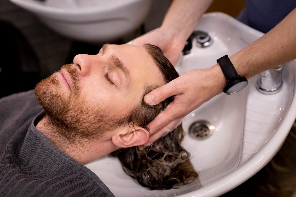 hairdresser grooming their client 1