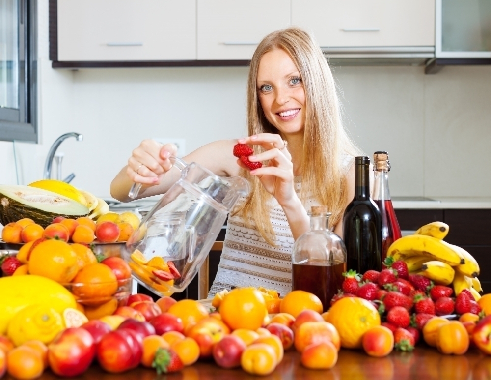 woman surrounded by vitamins